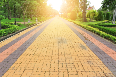 Stone block walk path in the park  :Select focus with shallow depth of field.の写真素材