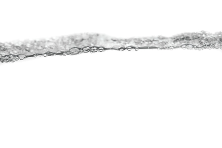 Water splash, and bubbles of air show the motion on white background, with copy space.の写真素材