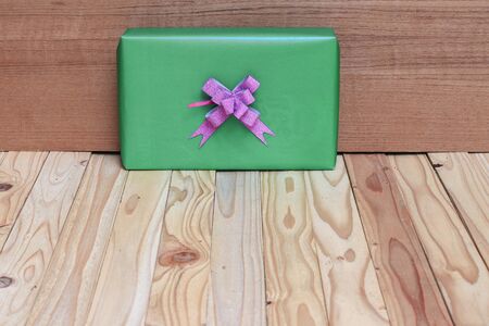gift Christmas day and happy new year  on  wooden backgroundの写真素材