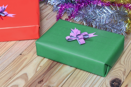 gift Christmas day and happy new year  on  wooden backgroundの写真素材