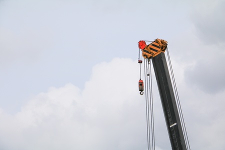 Crane Hook with   sky which has raincloudの写真素材