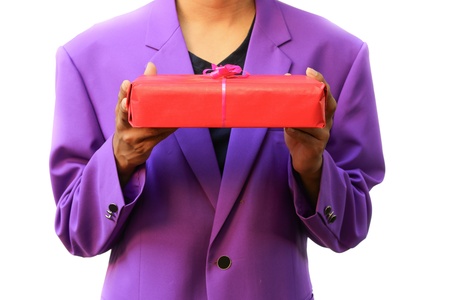 man hand holding out a new year gift on white backgroundの写真素材