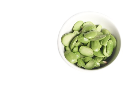 Parkia speciosa in  cup  on white background ( bean petai, twisted,  cluster, stink, bitter, sato )の写真素材