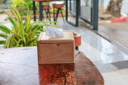 tissue paper wood box beautiful on the tableの写真素材