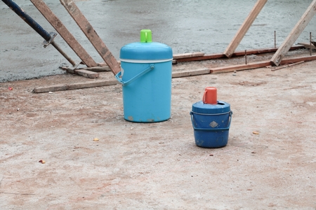Flask water of worker in construction siteの写真素材