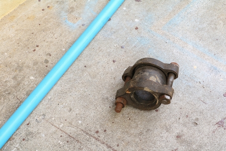 Plumbing fittings,  Union brass joint old on the cement floor