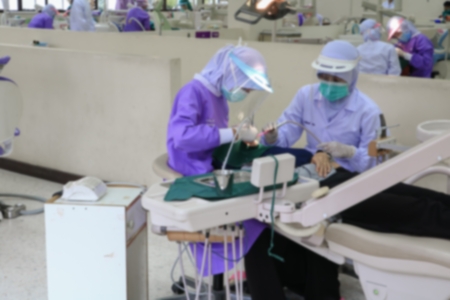 Focus blur dentist in dental patient medicalの写真素材