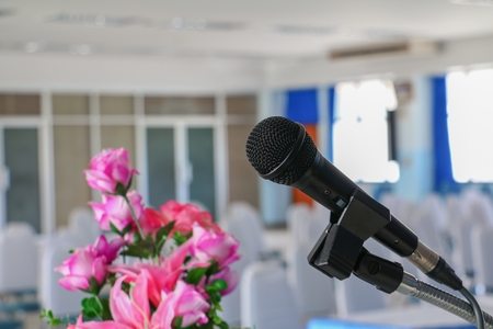 microphone on stand Close up in conference room :Select focus with shallow depth of field.の写真素材