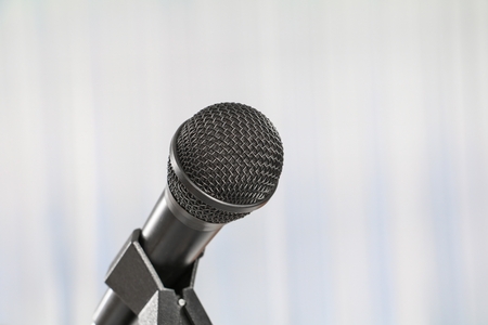 microphone on stand Close up in conference room :Select focus with shallow depth of field.