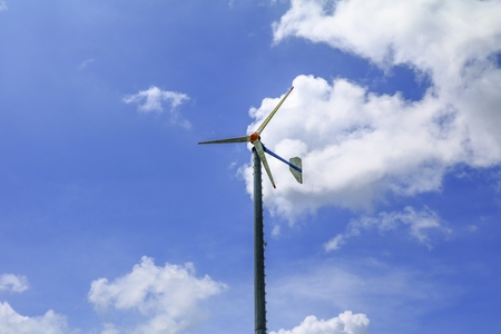 Wind Turbine for alternative energy on sky  background with copy space for add text