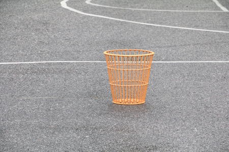 basket for playing chairball game wet field asphalt.の写真素材