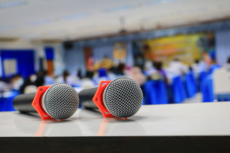 microphone on the  table in conference room :Select focus with shallow depth of field.の写真素材