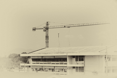 crane in construction building site. vintage tone imageの写真素材
