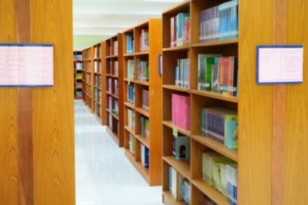 focus blur for library public room and books in shelfの写真素材