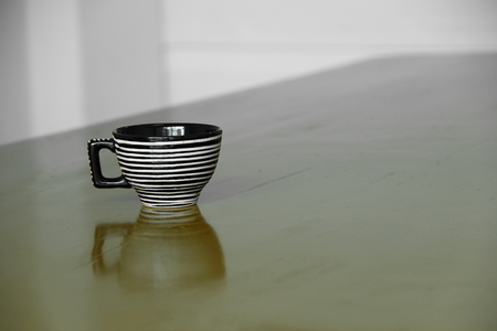 coffee cup on the wood table  backgroundの写真素材