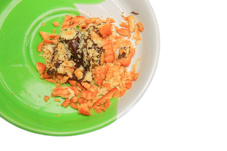 cookies chocolate bread broke macro focus in the plate on white backgroundの写真素材