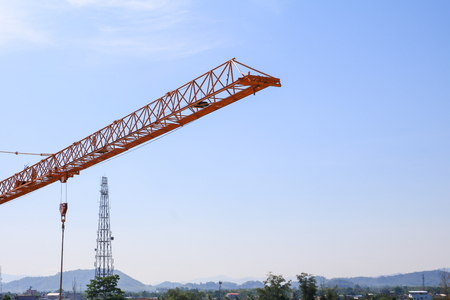 crane in construction building site on sky backgroundの写真素材