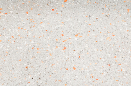 terrazzo floor. small stone orange old texture or marble backgroundの写真素材