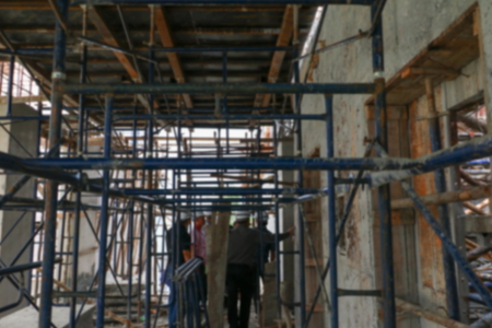 blur focus businessman and engineering in construction building