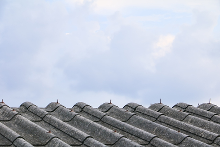 cement roof tiles old with sky background and copy space. select focus shallow depth of fieldの写真素材
