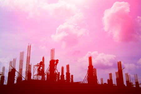 silhouette worker team working construction site pink sky background with copy space add text