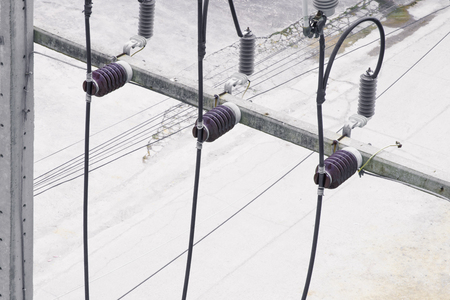 Electricity porcelain insulator on pole with copy space add text ( top view )の写真素材