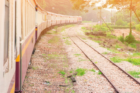 train run travel in countryside with sun light and copy space add text. select focus with shallow depth of fieldの写真素材
