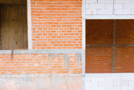 wall made brick construction site outside in building high with copy space add textの写真素材