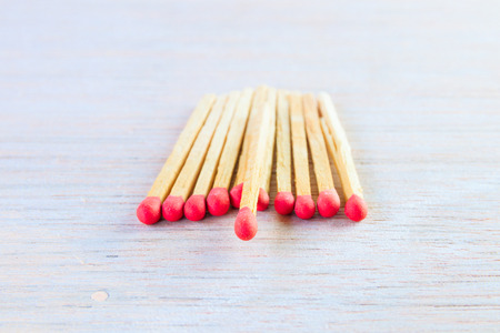 match stalk with red head concept energy old vintage on wooden floor background with copy space add text  ( high definition image )の写真素材