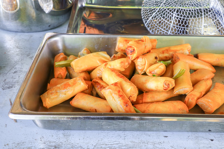 fried spring rolls In the tray on wooden table