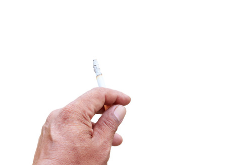 hand holding burn cigarette at hazard,isolated on white background and clipping path. concept Health...