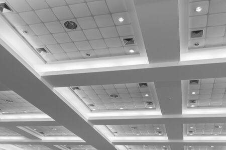ceiling of business interior office building and light neon. style monochrome with copy space add textの写真素材