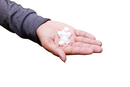 pills in hand male isolated on white background and clipping path. Stop drug use concept