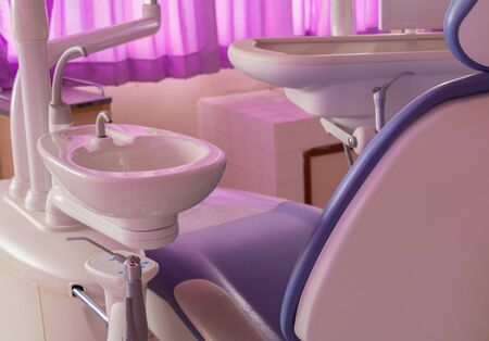 sink water spout in clinic dental and instruments tool. specialized treat types of disease teeth oralの写真素材