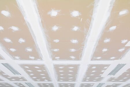 gypsum board ceiling structure and plaster mortar wall painted foundation white decorate interior...