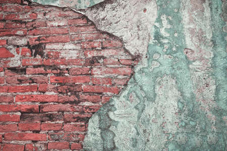 red brick block wall texture old background ancient weathered brick wall with cracks and destroyed...