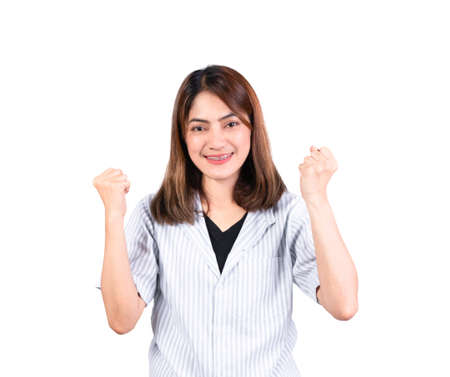 woman hand raising fist up symbol isolated on white backgroundの写真素材