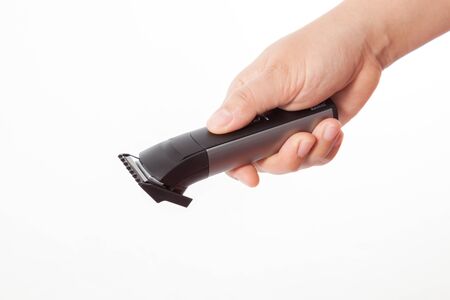 Handle the machine for a hairstyle of hair isolated on white background.の写真素材
