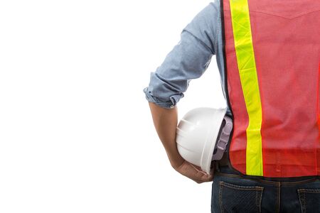 Behind the young engineer hat isolated on white background.の写真素材