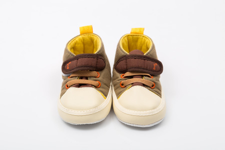 Baby shoes on the white background.の写真素材