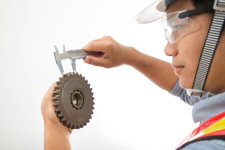 The young engineer isolated on white background.の写真素材
