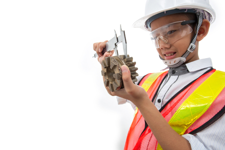 The boy dreams of being an engineer isolated on white background.の写真素材