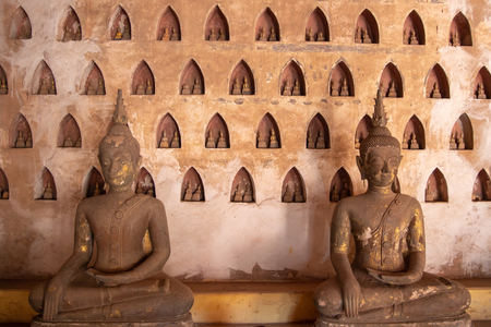 Laos, Old Buddha image in Wat Sisaket popular place to visit in Vientiane city and landmark, Old buddha statue in laos (Vientiane, Laos)の写真素材