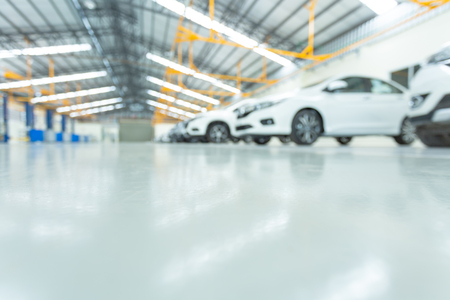 epoxy floor in interior car, interior car-care center. cars in the service put on the epoxy floor, The electric lift for cars.の写真素材
