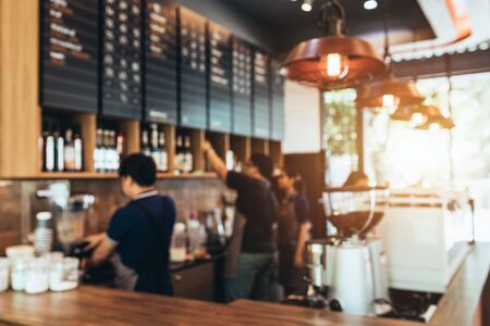 Blurred background made with Vintage Tones,Coffee shop blur background with Coffee Shop Bar Counter Cafe Restaurant Relaxation Concept.の写真素材