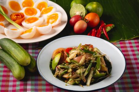 [Thai Esan food] Papaya Salad with boiled egg, Thai Esan local food, Thailandの写真素材