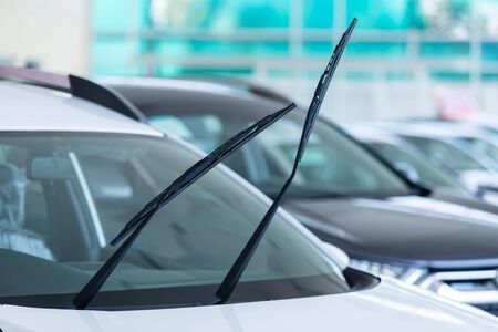 Car windshield rain wiper for new cars in the showroomの写真素材