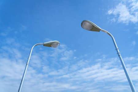 Solar light bulb, metallic post in a street power to light a led bulb, Solar powered lamp.