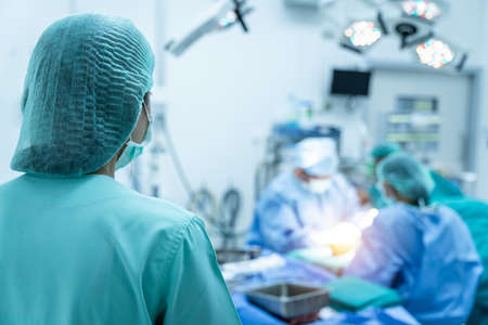 assistant or staff of Team surgeon at work in operating room.の写真素材