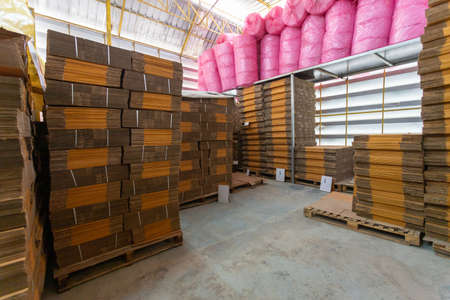 Cardboard boxes on a pallet in warehouse.の写真素材